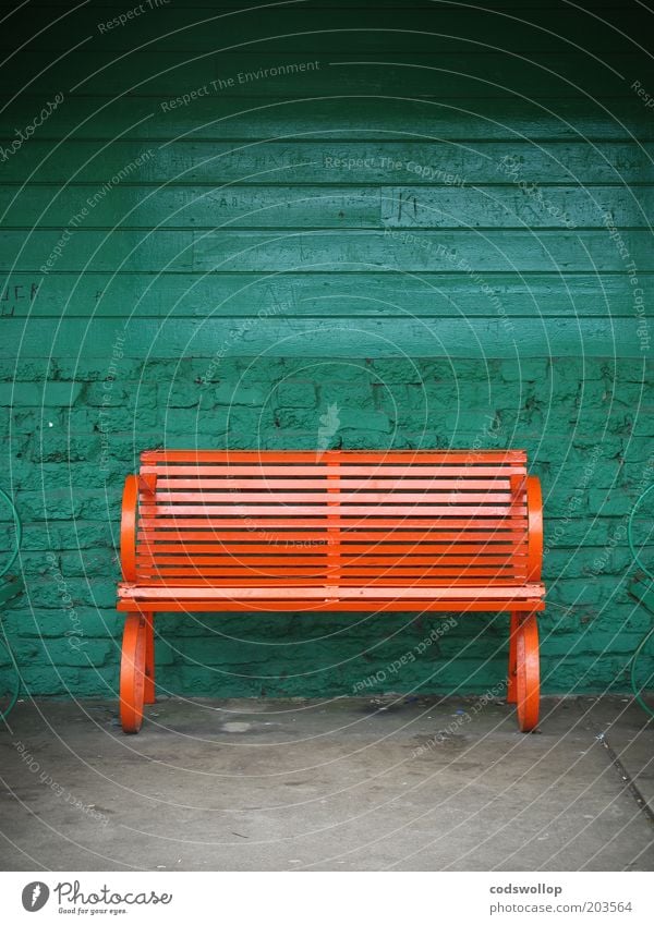 two-seater Wall (barrier) Wall (building) Bench Esthetic Green Orange Bus stop Colour photo Exterior shot Copy Space top Day Deserted