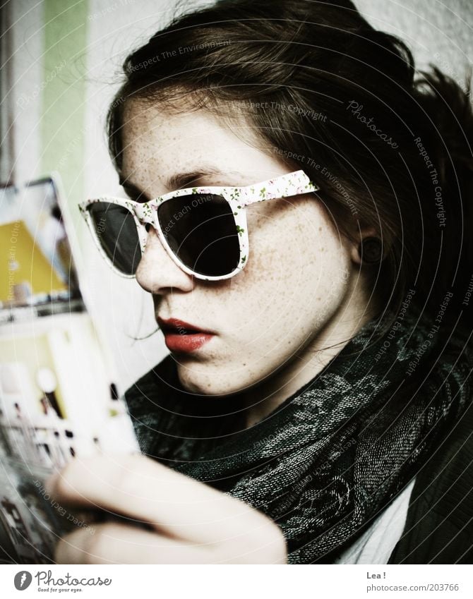 poker face Human being Feminine Youth (Young adults) Head 1 Accessory Sunglasses Reading Modern Colour photo Interior shot Day Central perspective Rag Magazine