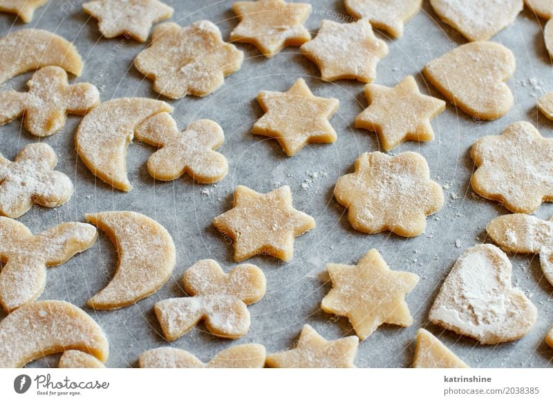 Close up of cookies before oven on a paper Dough Baked goods Dessert Kitchen Heart Make Baking Bakery biscuit cooking Cutter Knife Flour food Home-made