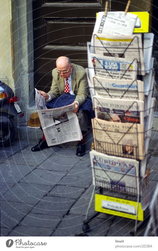 newspaper readers Florence Italy Newspaper Reading Literature Man Sit