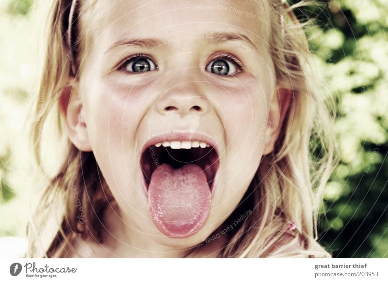 Mad little girl Child Toddler Girl Infancy Head 3 - 8 years Uniqueness Tongue Crazy Spontaneous Brash Funny Provocative Cute Colour photo Exterior shot Close-up
