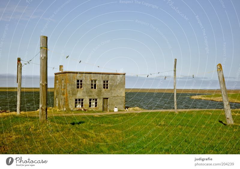 Iceland Water Sky Beautiful weather Meadow Coast Bay House (Residential Structure) Hut Building Old Loneliness Idyll Clothesline Clothes peg Uninhabited