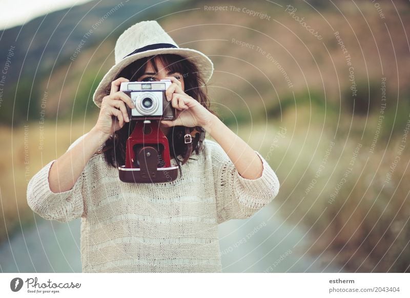 Smiling girl with camera in the field Lifestyle Vacation & Travel Tourism Trip Adventure Freedom Sightseeing Summer Summer vacation Camera Human being