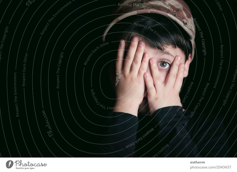 Scared boy on black background Human being Child Boy (child) Head Eyes 1 3 - 8 years Infancy Fight Looking Cry Threat Curiosity Gloomy Emotions Sadness Concern