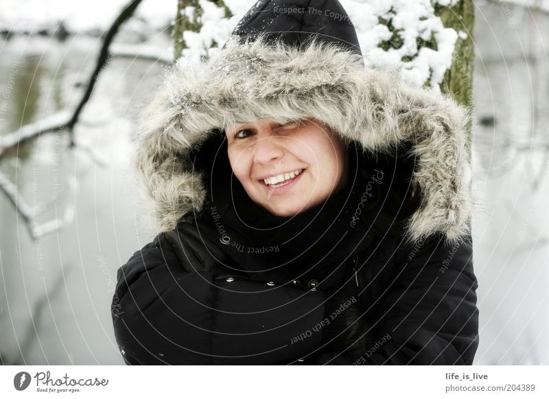 Now we have to dress warm. Young woman Youth (Young adults) 1 Human being Winter Snow Pelt Smiling Brash Happiness Beautiful Cold Feminine Sympathy Colour photo