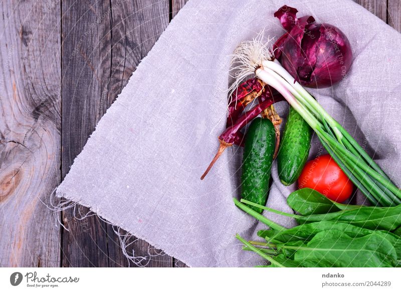 Fresh vegetables Food Vegetable Nutrition Vegetarian diet Diet Table Kitchen Wood Natural Gray Green Red Health care Tomato cucumber onions lettuce pepper