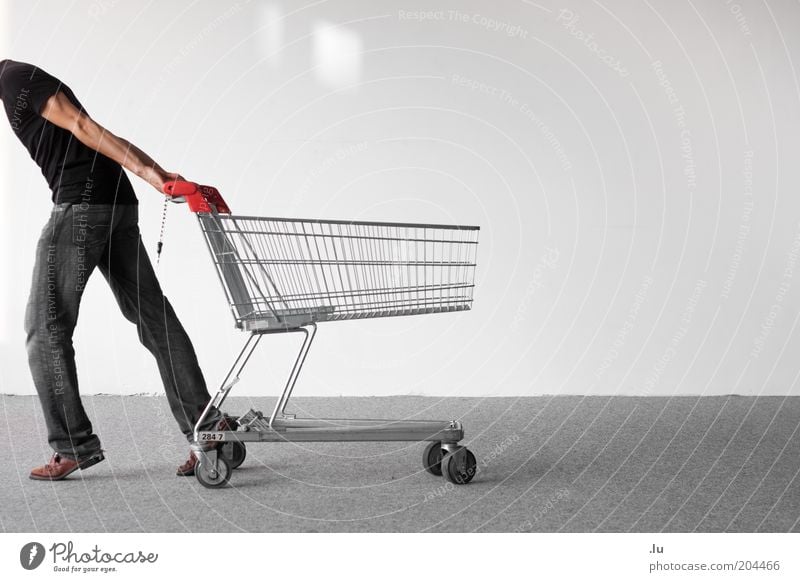 shopping frenzy Shopping Masculine Man Adults 1 Human being Shopping Trolley Save Cheap Thrifty Partially visible Consumption Direction Headless Pull