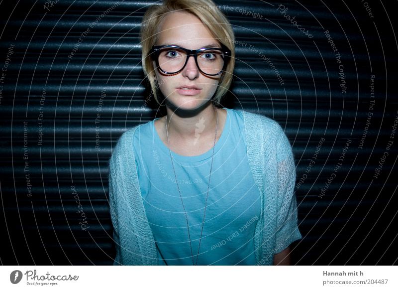 Rigid Feminine 1 Human being Colour photo Interior shot Front view Looking into the camera Forward Young woman Nerdy Freak Spectacle frame Vision Blonde