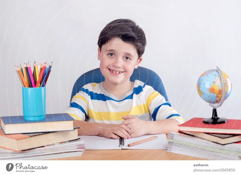 Smiling boy studying sitting on a chair Lifestyle Parenting Education Kindergarten Child School Study Schoolchild Student Human being Toddler Boy (child)