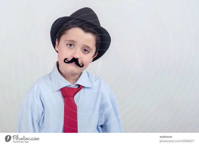Funny boy with fake mustache and tie Lifestyle Party Event Feasts & Celebrations Mother's Day Carnival Parenting Education Child Apprentice Work and employment