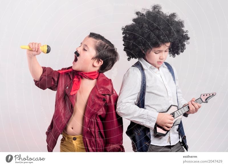 Children disguised as rock stars Lifestyle Joy Party Event Music Human being Toddler Boy (child) Infancy 2 3 - 8 years Artist Stage play Theatre Dance Shows