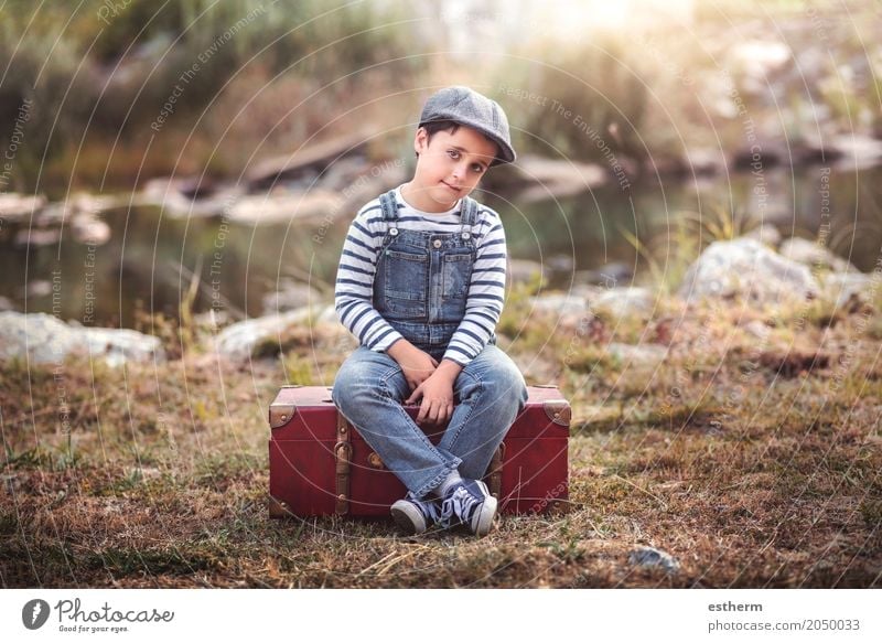 Pensive boy sitting in a suitcase Lifestyle Vacation & Travel Trip Adventure Freedom Human being Masculine Child Toddler Boy (child) Infancy 1 3 - 8 years