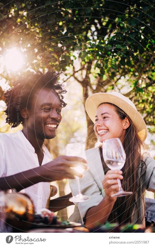 Cute mixed race couple enjoying wine together on date Lunch Beverage Drinking Cold drink Alcoholic drinks Wine Glass Joy Summer Restaurant Going out