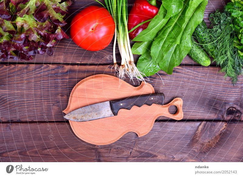 Fresh vegetables and a cutting board Vegetable Diet Knives Wood Eating Delicious Above Green Red Onion Ingredients Raw background empty space vintage Salad