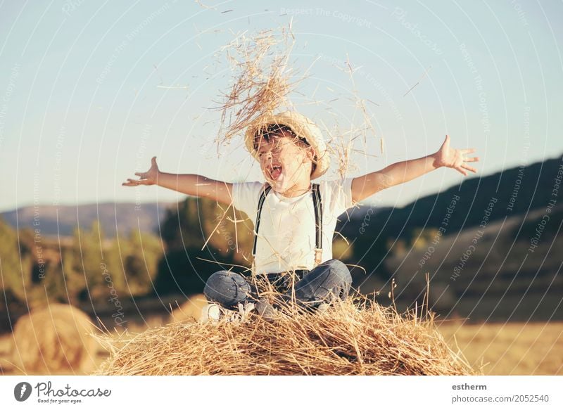 Kid playing in wheat field. Happy child on a field with bales harvest Lifestyle Joy Wellness Human being Masculine Child Toddler Boy (child) Infancy 1