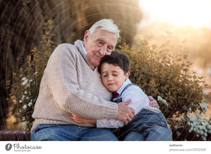 Portrait of grandfather and grandson embracing Lifestyle Human being Masculine Child Toddler Boy (child) Grandparents Senior citizen Grandfather