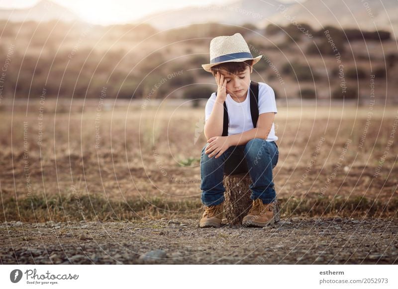 Little thoughtful boy Lifestyle Adventure Freedom Human being Child Toddler Boy (child) Infancy 1 3 - 8 years Environment Spring Summer Meadow Field Sadness