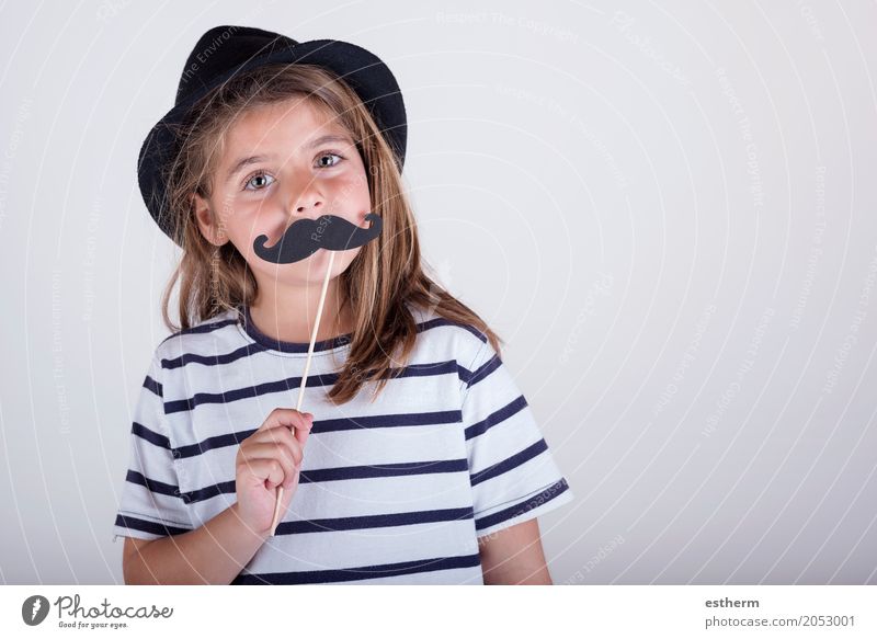 Beautiful cute little girl playing with mustache Lifestyle Feasts & Celebrations Mother's Day Carnival Human being Feminine Girl Parents Adults Father