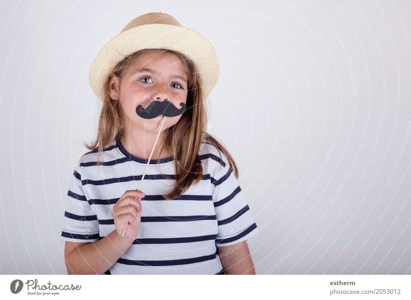 Beautiful cute little girl playing with mustache Lifestyle Feasts & Celebrations Mother's Day Carnival Human being Girl Parents Adults Father Family & Relations