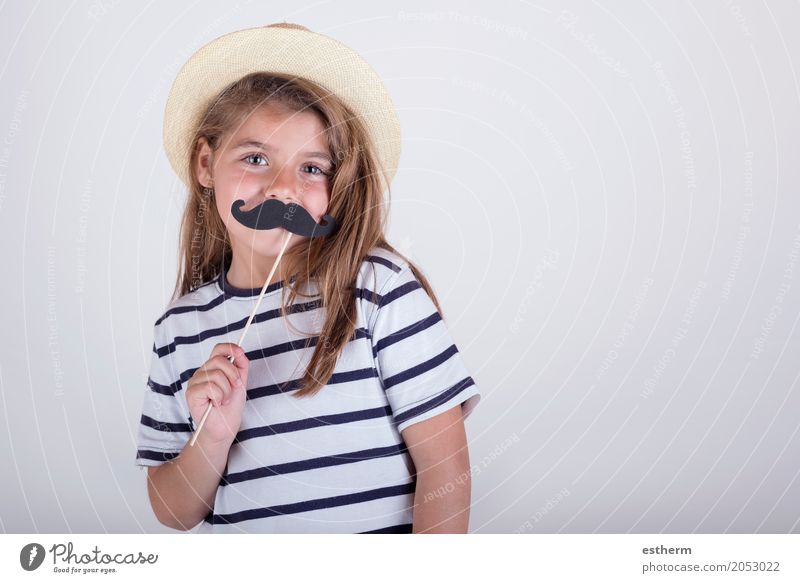 Beautiful cute little girl playing with mustache Lifestyle Joy Feasts & Celebrations Mother's Day Carnival Human being Girl Family & Relations Infancy 1
