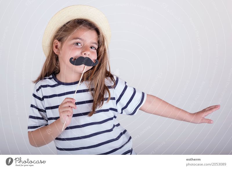 Beautiful cute little girl playing with mustache Lifestyle Party Event Feasts & Celebrations Mother's Day Human being Feminine Girl Parents Adults Father