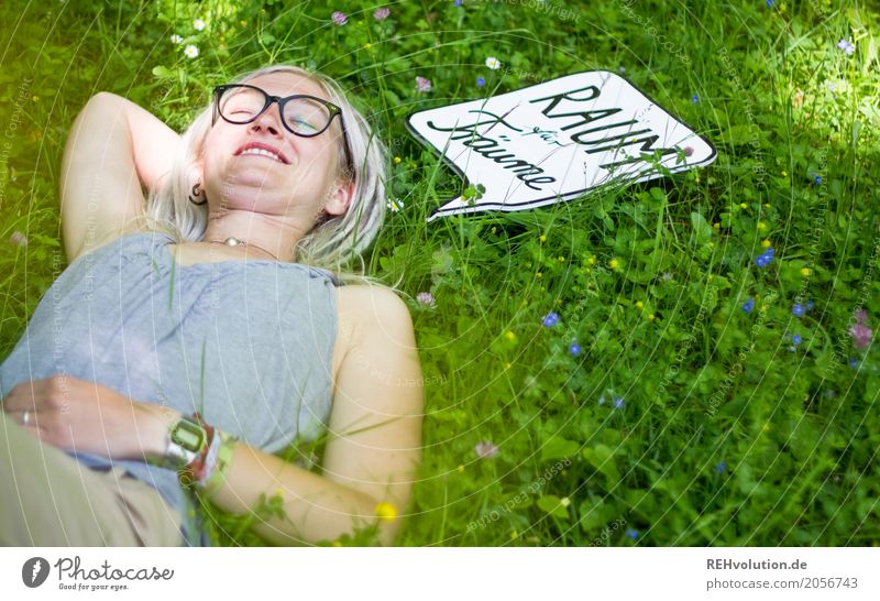 Jule - Young woman lying on the meadow with a speech bubble Youth (Young adults) Woman Adults Feminine Human being Face 1 18 - 30 years Environment Nature Grass