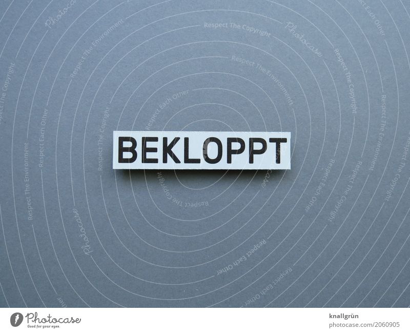 BECLOPPT Characters Signs and labeling Communicate Sharp-edged Gray Black White Emotions Moody Stupid Goofy Cuss word Derogative Rant Colour photo Studio shot