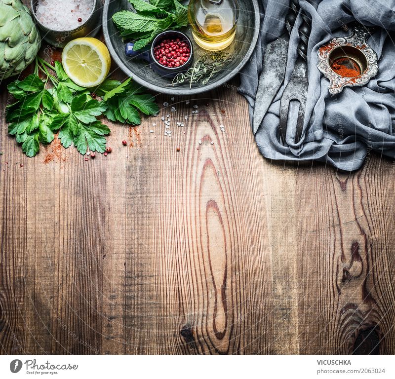 Fresh kitchen herbs and spices on a rustic kitchen table Food Herbs and spices Cooking oil Nutrition Organic produce Vegetarian diet Diet Crockery Style Design