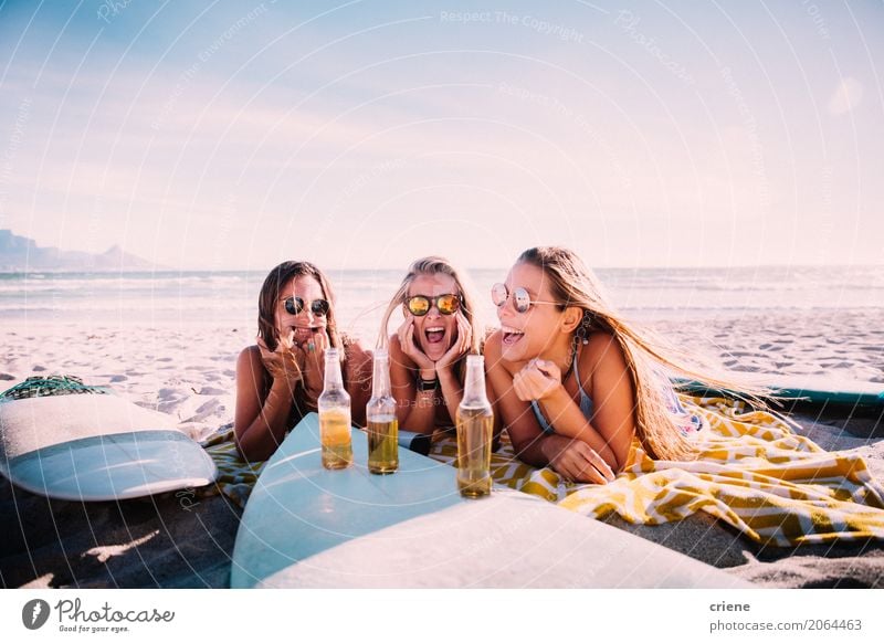 Young adult girls drinking beer at the beach and having fun Beverage Drinking Cold drink Alcoholic drinks Beer Bottle Lifestyle Joy Leisure and hobbies