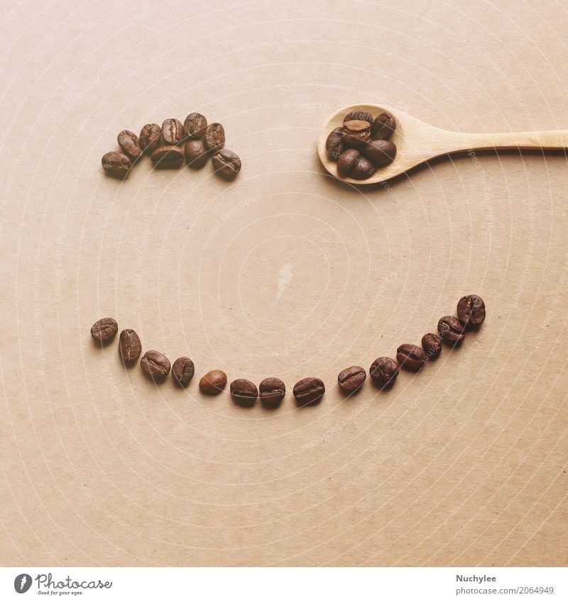 Happy face shaped of coffee beans with wooden spoon To have a coffee Beverage Coffee Spoon Design Beautiful Face Decoration Wallpaper Art Wood Smiling Happiness