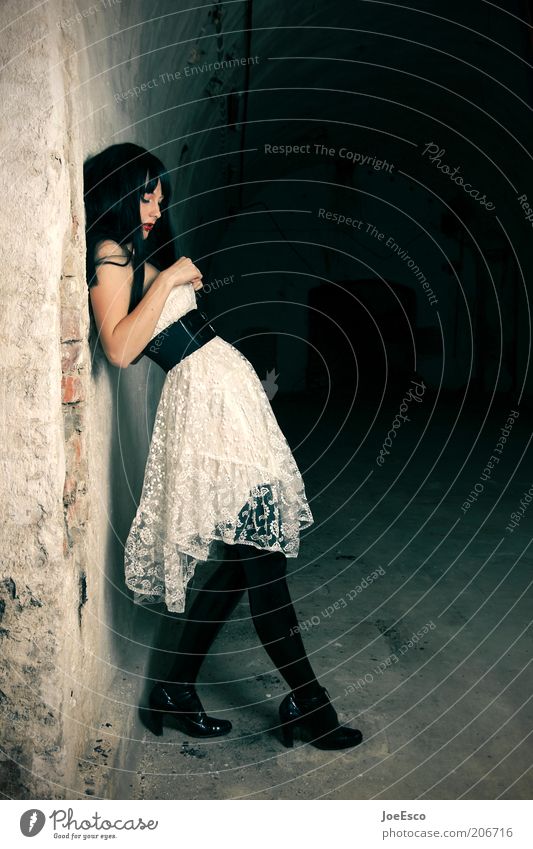 alone in the dark... Lifestyle Elegant Beautiful Feminine Woman Adults 1 Human being Wall (barrier) Wall (building) Belt Boots Black-haired Long-haired Esthetic