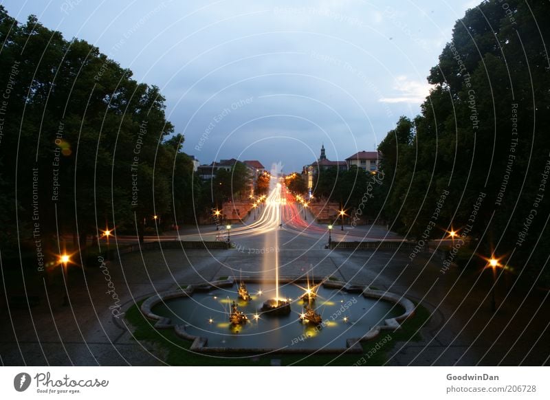 long exposure - where am I? Water Transport Illuminate Well Water fountain Light Long exposure Evening Dusk Fountain Strip of light Tracer path Lighting