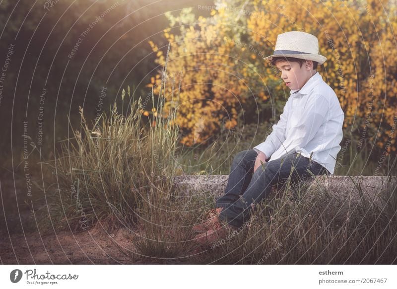 thoughtful little boy sitting on field Lifestyle Human being Masculine Child Toddler Boy (child) Infancy 1 3 - 8 years Nature Spring Summer Autumn Garden Forest