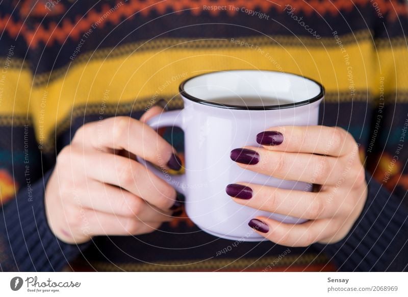 https://www.photocase.com/photos/2068969-woman-in-cozy-sweater-holding-a-cup-breakfast-photocase-stock-photo-large.jpeg