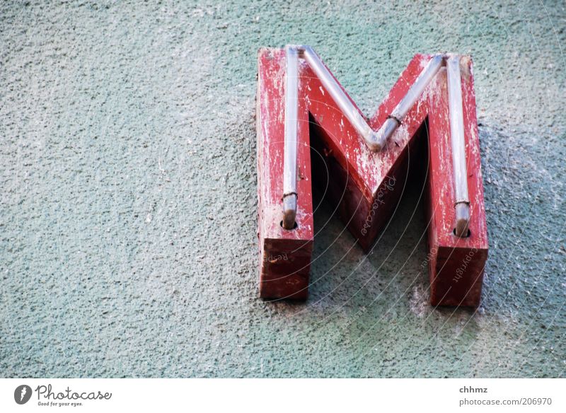 m Wall (barrier) Wall (building) Letters (alphabet) Neon sign Red Old Characters Dirty Decline Decompose Advertising Copy Space left Exterior shot Facade