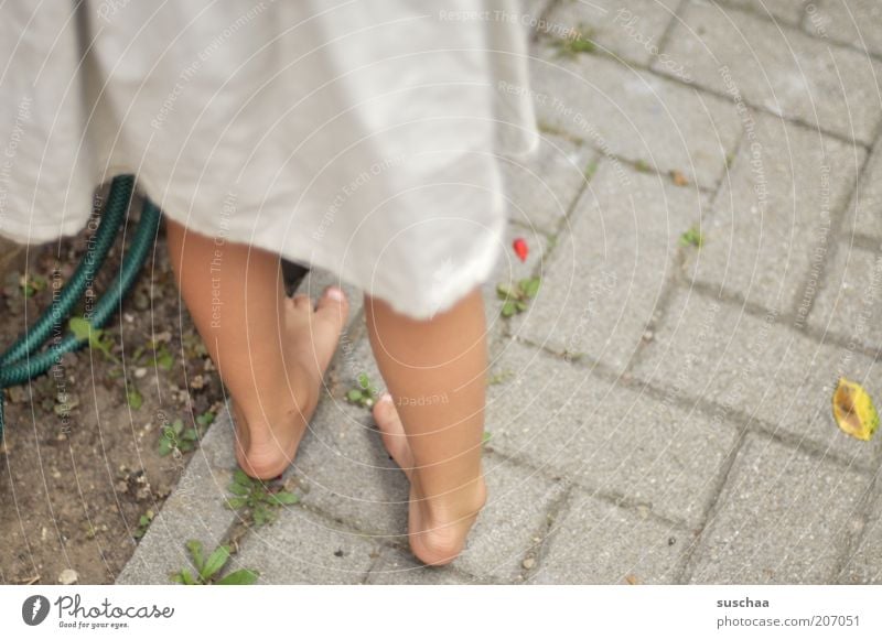 without shoes and stockings ... Feminine Girl Infancy Life 1 Human being Environment Summer Garden Concrete Stand Lanes & trails Contentment Dress Legs Feet