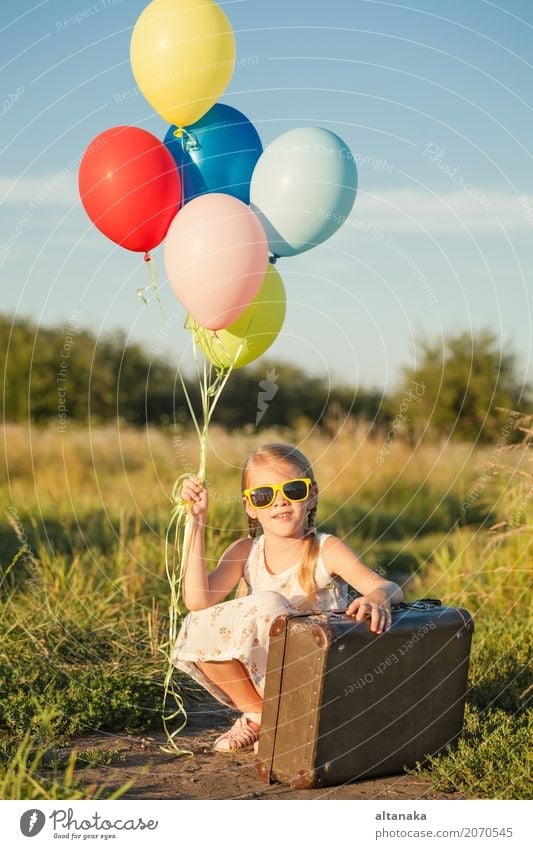 Happy little girl playing on road Lifestyle Joy Leisure and hobbies Playing Vacation & Travel Trip Adventure Freedom Camping Summer Sun Hiking Child Human being