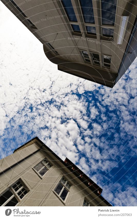 obliquely Environment Elements Air Clouds Town Populated House (Residential Structure) Manmade structures Building Architecture Looking White Blue Window