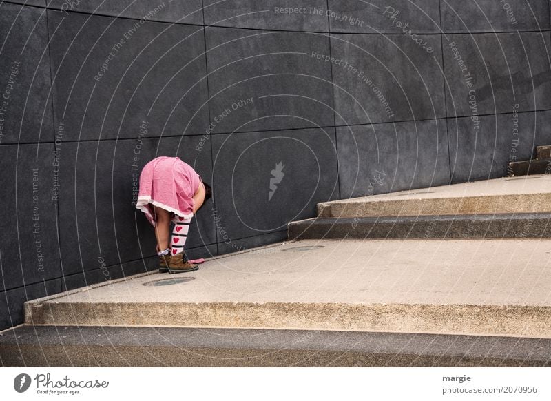 AST 10 | Herzblatt, a girl in a dress and with heart-shaped stockings bends down Human being Feminine Young woman Youth (Young adults) Woman Adults Love Gray