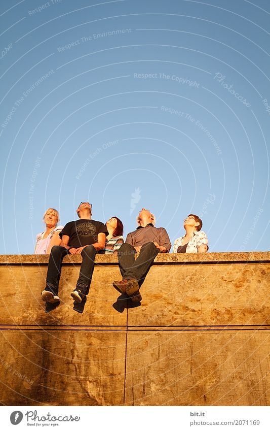 Wor look at the Lightdeck Human being Adults Group Sky Cloudless sky Beautiful weather Wall (barrier) Wall (building) Looking Sit Tall Moody Joy Happy Happiness