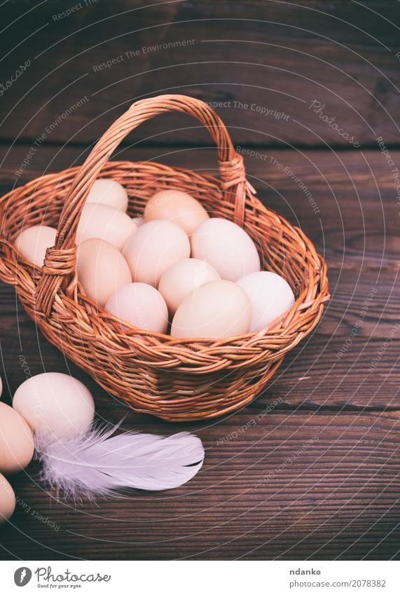 basket with raw chicken eggs Eating Breakfast Diet Table Easter Wood Fresh Natural Above Brown Tradition Chicken Organic Farm Tasty healthy Shell Fragile