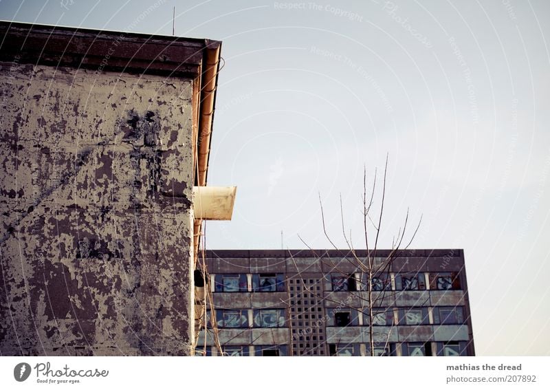 decay Deserted Manmade structures Building Architecture Facade Window Sign Graffiti Old Dark Sharp-edged Cold Gloomy Colour photo Subdued colour Exterior shot