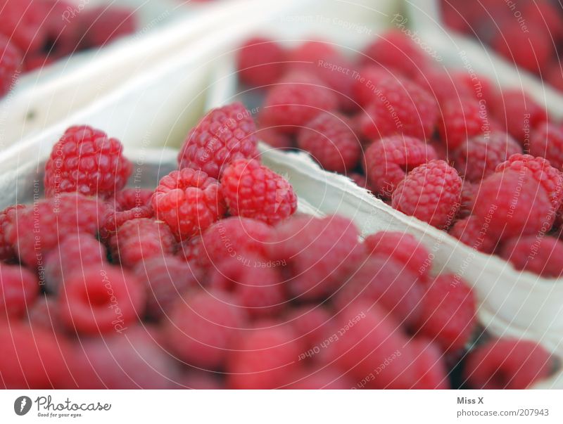 raspberries Food Fruit Nutrition Organic produce Vegetarian diet Small Delicious Juicy Sour Sweet Raspberry Berries Market stall Farmer's market Colour photo