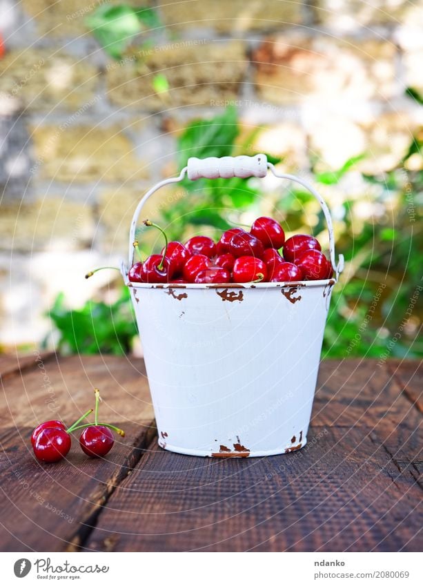 Red ripe cherry Fruit Dessert Nutrition Vegetarian diet Diet Juice Bowl Summer Garden Table Nature Wood Eating Fresh Bright Delicious Natural Juicy White many