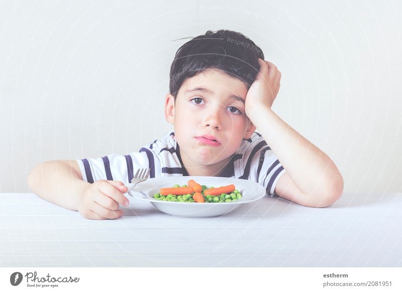 Sad child with a meal Food Vegetable Nutrition Eating Plate Fork Lifestyle Healthy Eating House (Residential Structure) Human being Masculine Child Toddler