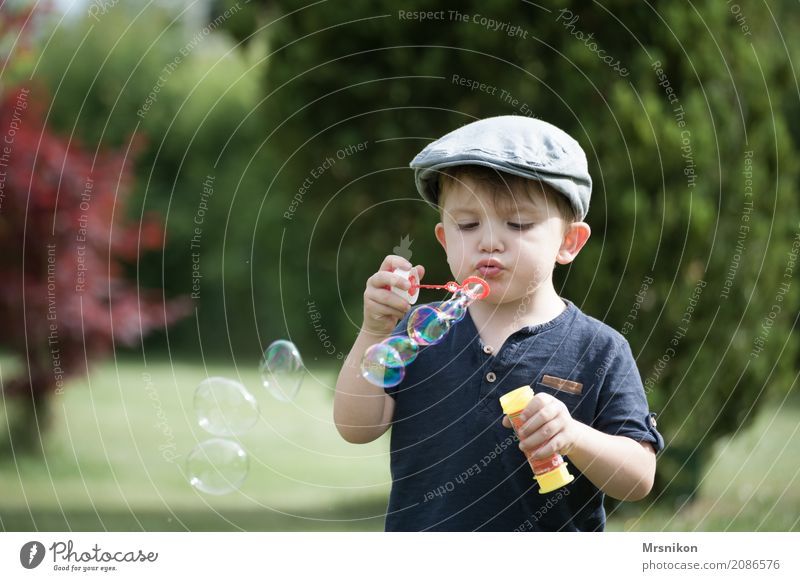 soap bubbles Child Toddler Young woman Youth (Young adults) Infancy Life 1 Human being 1 - 3 years Happiness Soap bubble Blow Children's game Happy Bubble