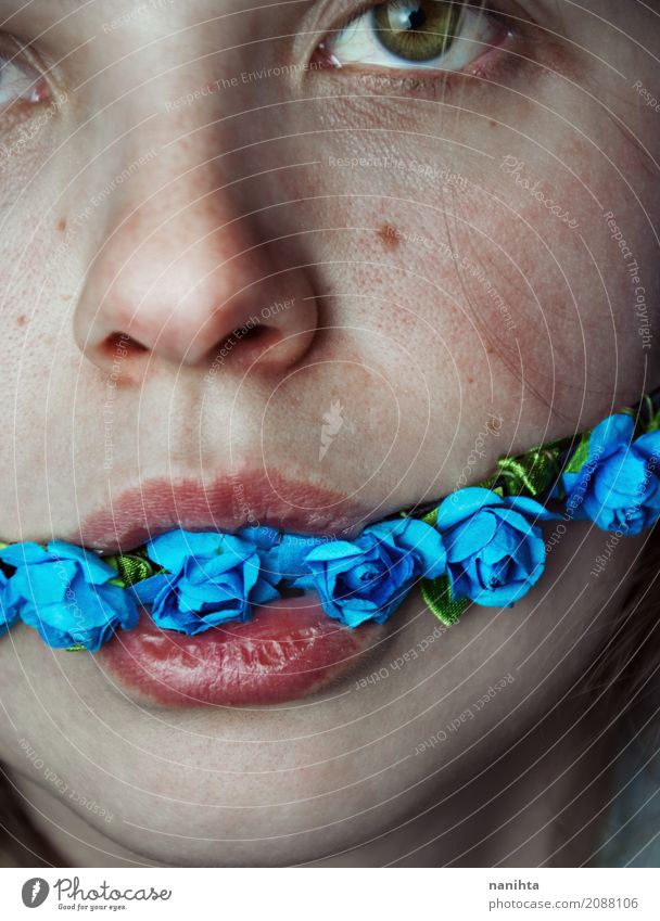 Artistic portrait of a young woman with flowers in her mouth Lifestyle Skin Face Eyes Lips Human being Feminine Young woman Youth (Young adults) 1 18 - 30 years