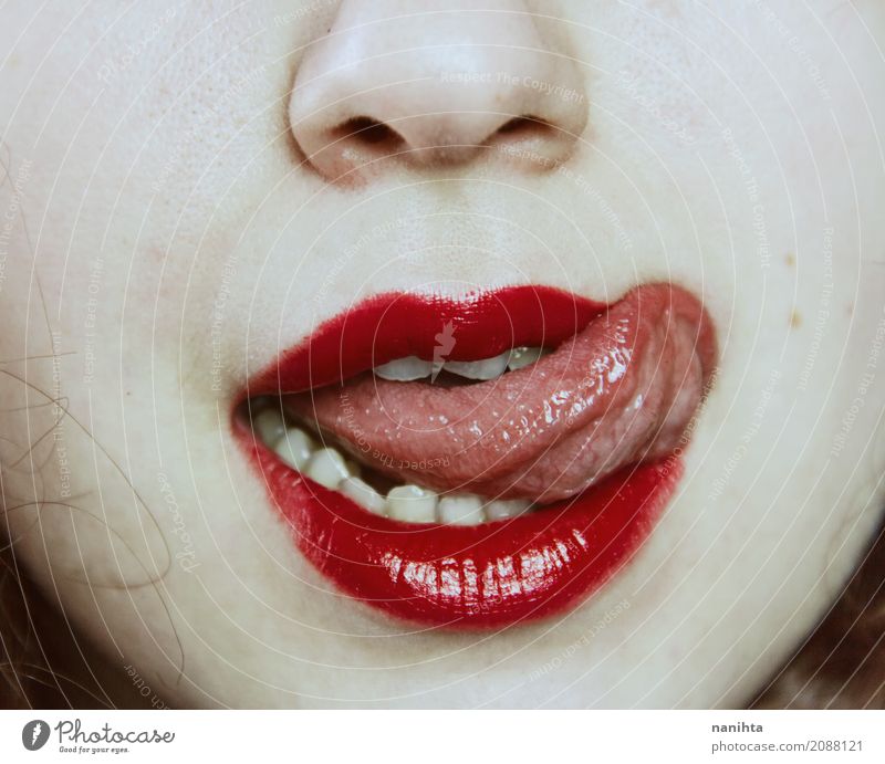 Close up of a young woman's mouth sticking out her tongue Skin Face Lipstick Human being Feminine Young woman Youth (Young adults) Nose Mouth Tongue 1