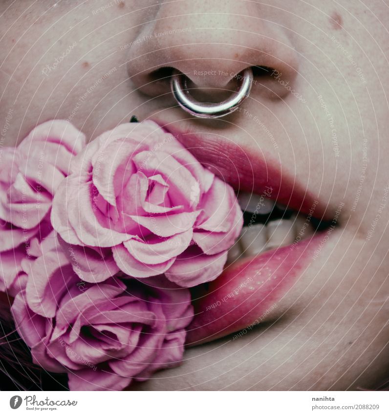 Close up of young woman's mouth biting flowers Beautiful Lipstick Feminine Young woman Youth (Young adults) Face Nose Mouth Teeth 1 Human being 18 - 30 years