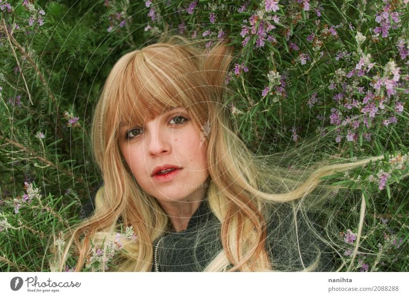 Portrait of a young blonde woman and rosemary flowers Lifestyle Healthy Wellness Relaxation Feminine Young woman Youth (Young adults) 1 Human being
